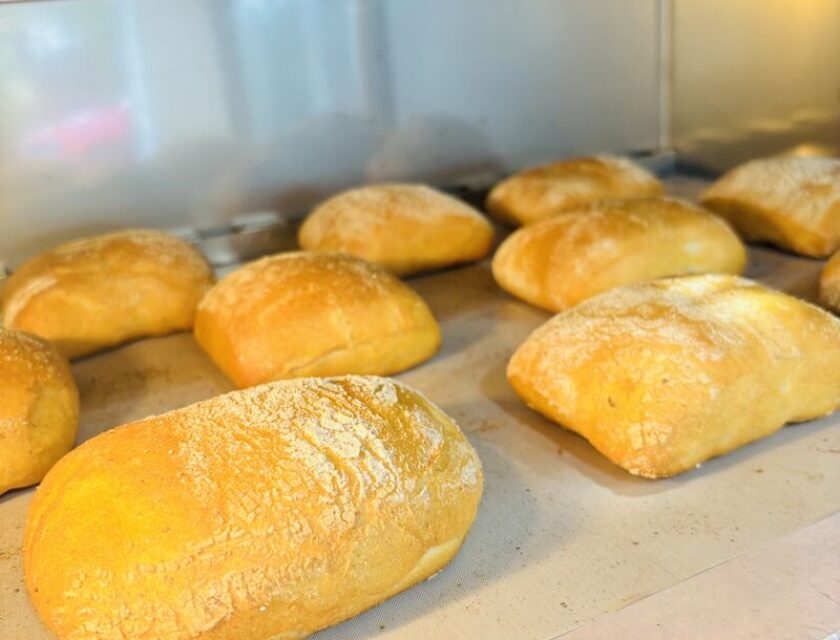 Freshly baked sourdough ciabatta rolls in the oven at the Fussnegger Ltd test bakery