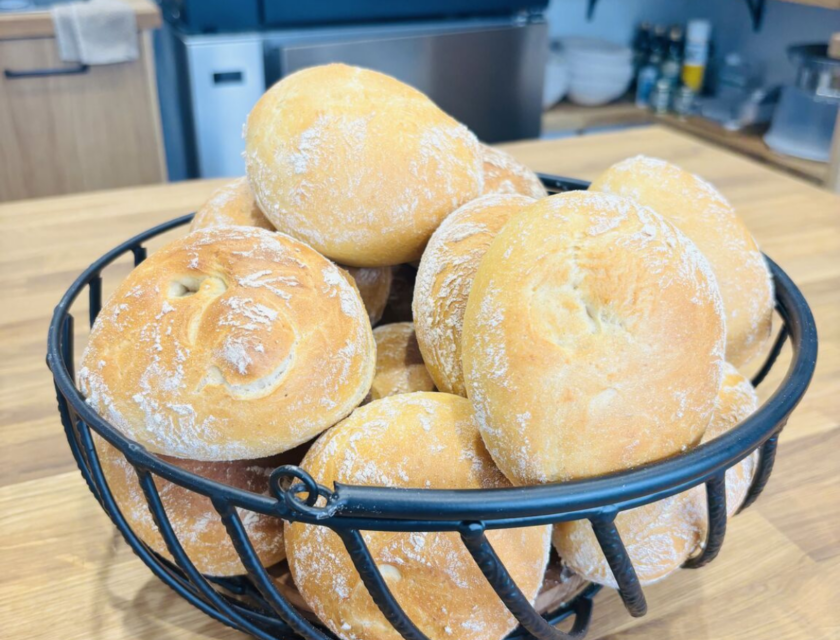 Basket of hand-moulded crusty rolls with rose moulding, fresh from the oven at the Fussnegger Ltd test bakery