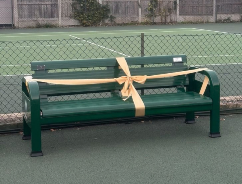 Bench sponsored by Fussnegger Ltd at the local tennis club, ribboned for the charity day