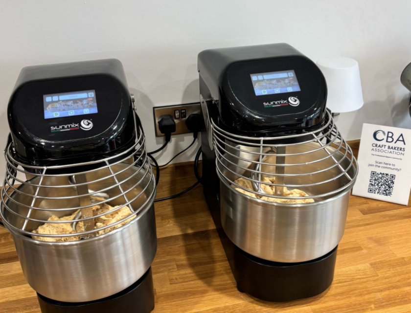 Two identical spiral mixers running the same dough side by side at the Fussnegger Ltd test bakery
